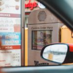 Transport Options - Person ordering fast food in drive thru